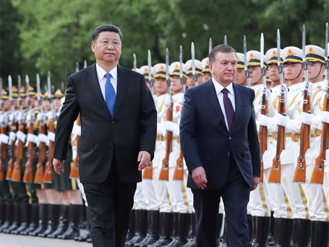 习近平举行仪式 欢迎乌兹别克斯坦共和国总统访华--人民视频--人民网